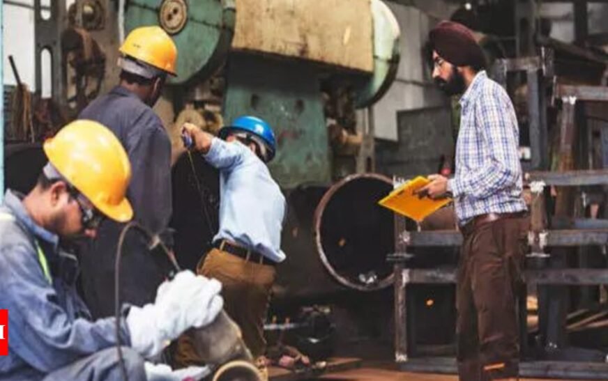 Industrial output contracts for 1st time in nearly 2 years